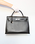 Kelly Sellier 40 Epsom Leather in Black, front view